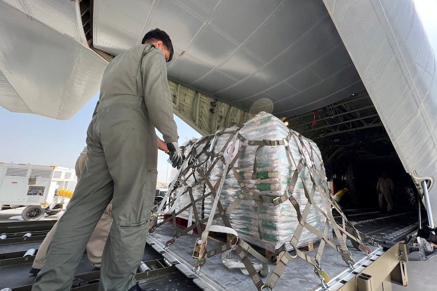 Humanitarian aid for Afghanistan loaded onto a plane