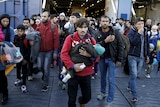 Asylum seekers aboard a Greek ferry