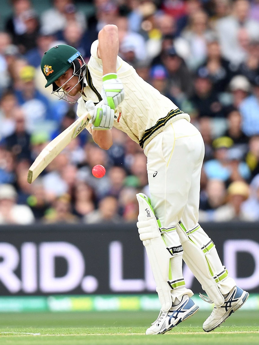 Cameron Bancroft plays a defensive shot to the leg side on day one of the second Ashes Test in Adelaide.