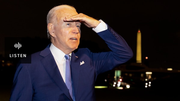 President Biden looks into the distance. Has Audio.