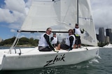 Craig McGrath (2nd from right) and his Invictus Games team-mates out sailing on Sydney Harbour