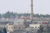 Syrian army troops pull out of the southern protest hub of Daraa
