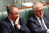 Barnaby Joyce and Malcolm Turnbull sit together in Parliament