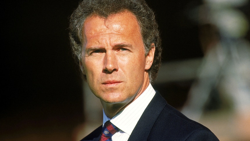 Franz Beckenbauer wearing a suit