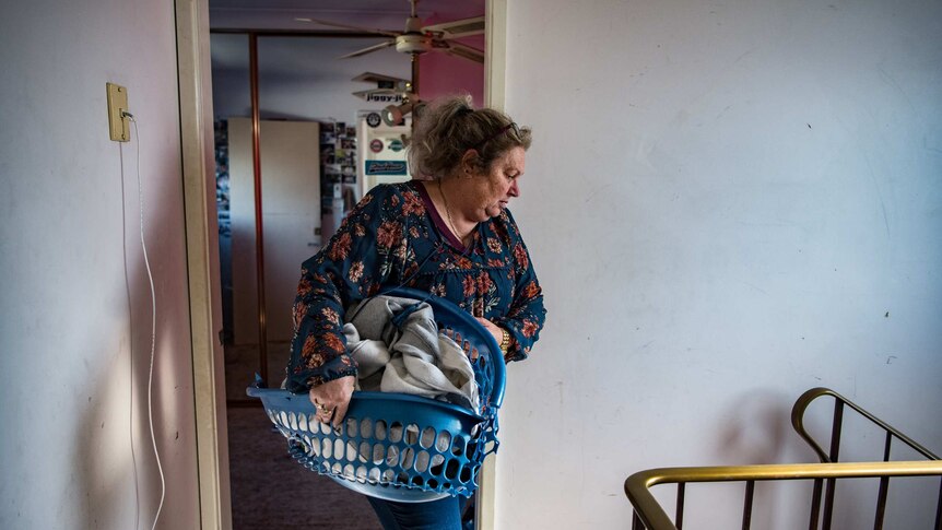 Kim Forrest is seen with her washing after being sued by A publicly listed debt collection company. Photo taken on July 11 2019
