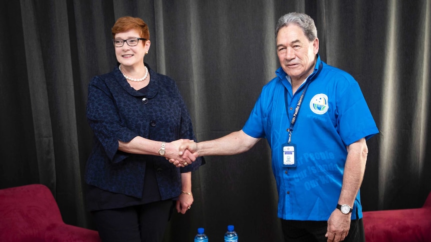 Marise Payne and Winston Peters shake hands before their meeting in Nauru for the Pacific Islands Forum.