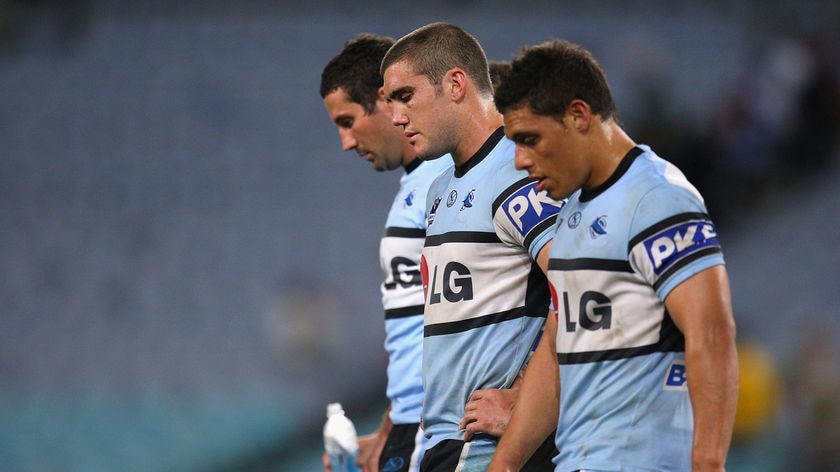 Kade Snowden (centre) has admitted the prospect of playing under Wayne Bennett is attractive.