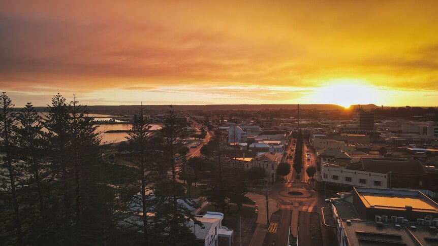 The sun rises over the Geraldton CBD.