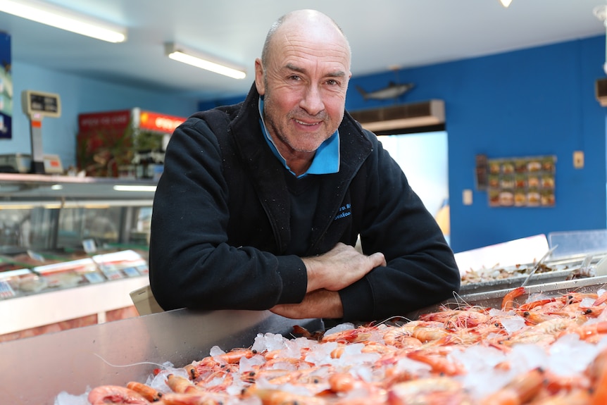 Rob Moir with prawns at seafood shop