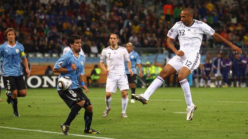 Tables turned: France striker Thierry Henry had an appeal for a penalty turned down for this handball.