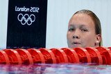 Palmer watches on in London pool