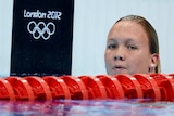 Palmer watches on in London pool