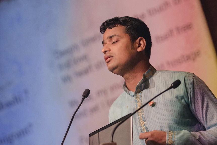 Shipyard worker Bikas Nath from Bangladesh performs his poem of longing