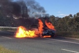 Car on fire on Hindmarsh Drive in Canberra.
