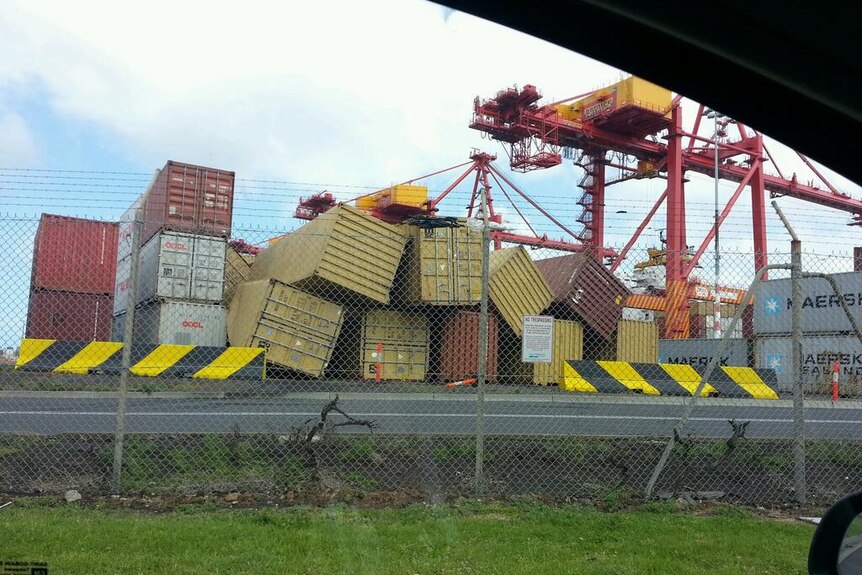 Shipping containers blown over at Port of Melbourne during strong winds across NSW and VIC