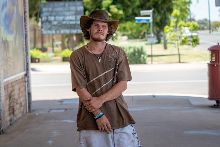 Tara resident Adam Young standing on a footpath in Tara, Queensland, December 2022.
