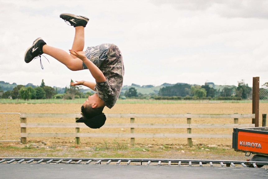 Kid on trampoline