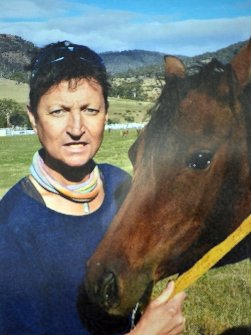 Family photo of Martin Harwood with a horse.