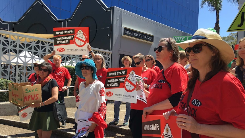 Unions and community members rallying in Wollongong against proposed National Parks staff cuts.