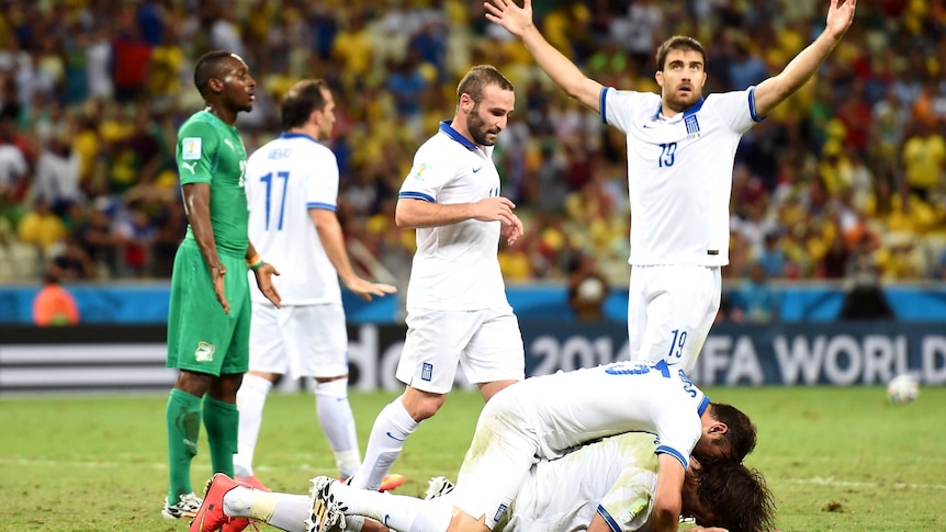 Greece celebrates Giorgios Samaras' winner