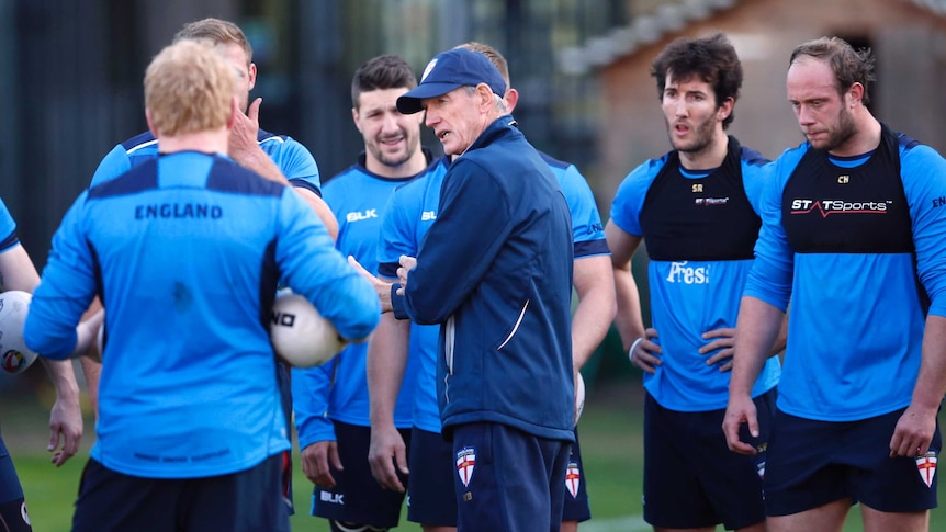 Coach Wayne Bennett talks to England rugby league players at training in London
