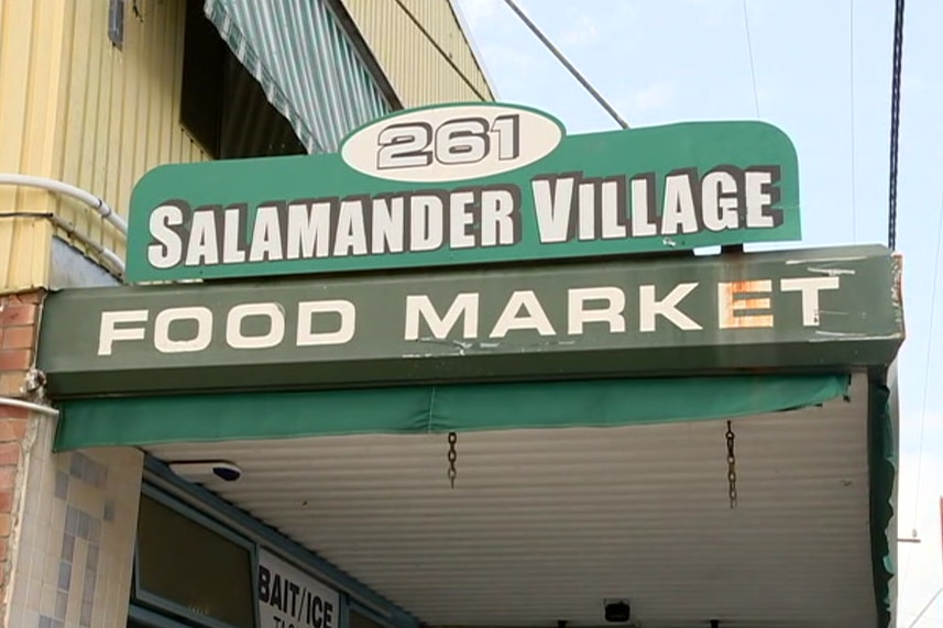 signage which reads salamander village food market