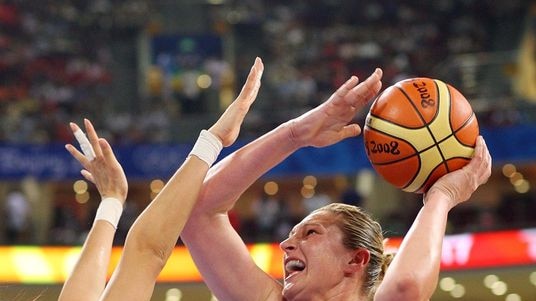 Opals player Suzy Batkovic drives past China's Liu Dan