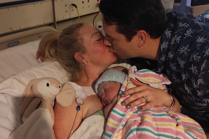 Krystal and Steven Edwards with their newborn Levi.
