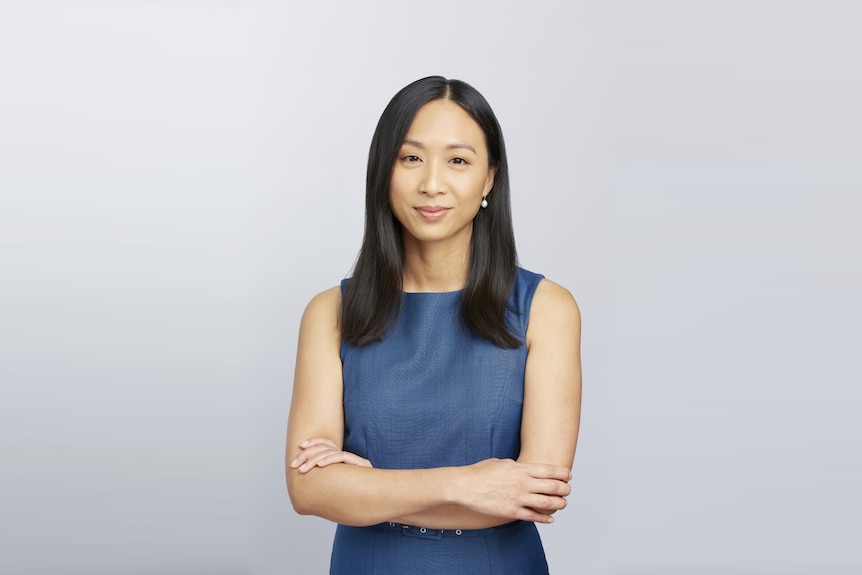 Catherine Mah standing with her arms folded 