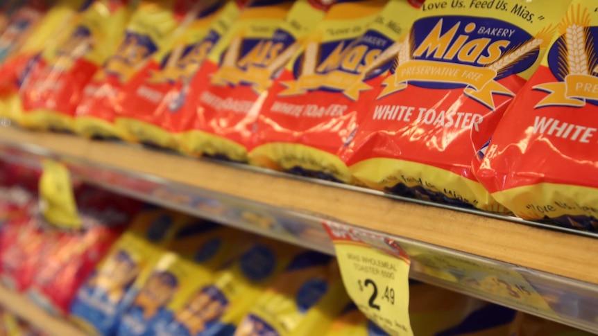 Rows of Mias bread on a supermarket shelf