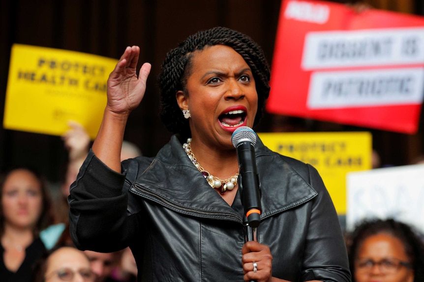 Democratic Congressional candidate Ayanna Pressley gestures as she speaks at a rally.