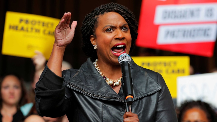 Democratic Congressional candidate Ayanna Pressley gestures as she speaks at a rally.