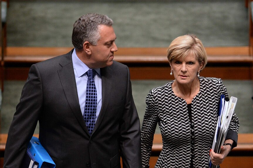 Treasurer Joe Hockey and Foreign Minister Julie Bishop arrive for Question Time.