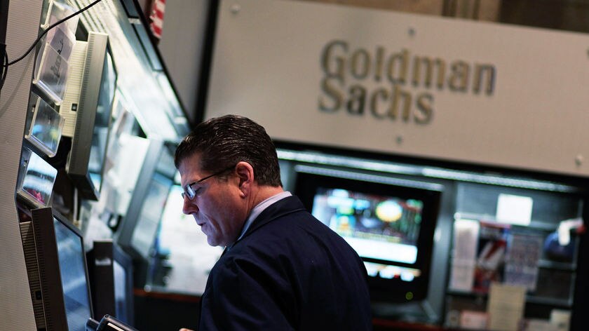 Man works in New York Stock Exchange's Goldman Sachs booth
