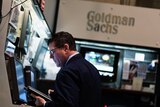Man works in New York Stock Exchange's Goldman Sachs booth