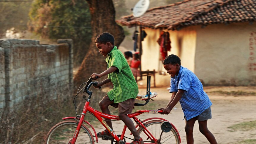 Boys play in Pasa, a village in the state of Chattisgarh.