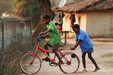 Boys play in Pasa, a village in the state of Chattisgarh.