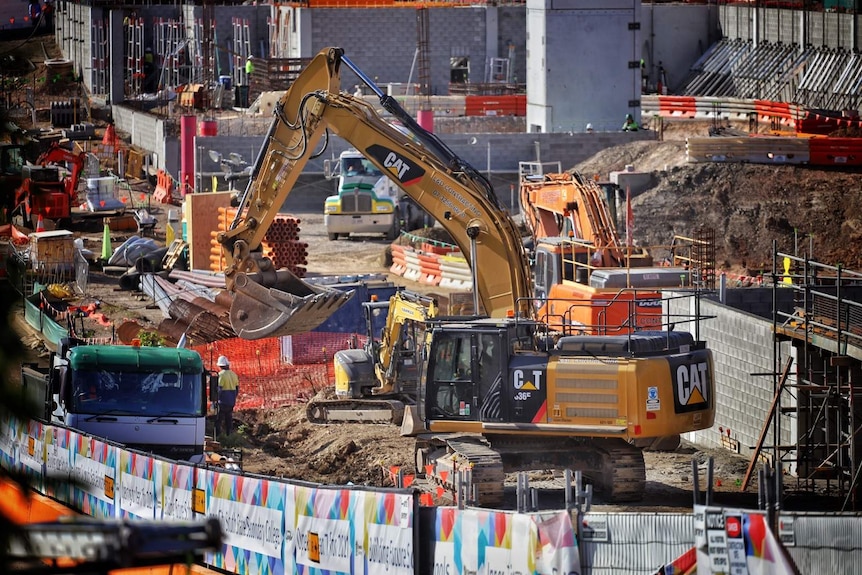 An earthmover on a large construction site