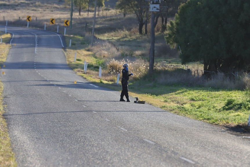 A police officer on a road in Oakey