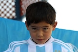 Young Afghan Messi fan with jersey