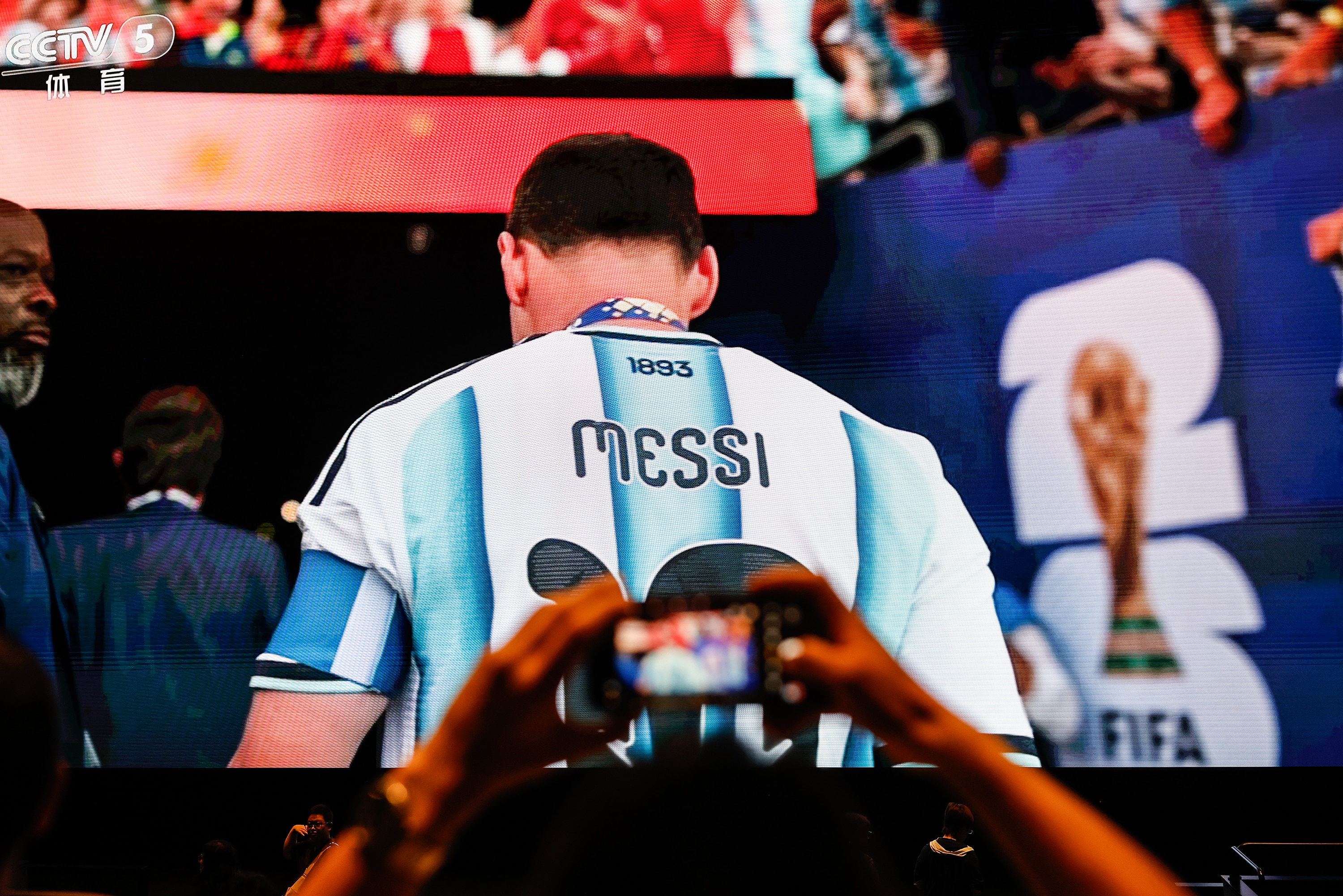 Lionel Messi walks down the tunnel