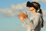 a woman wearing a VR visor