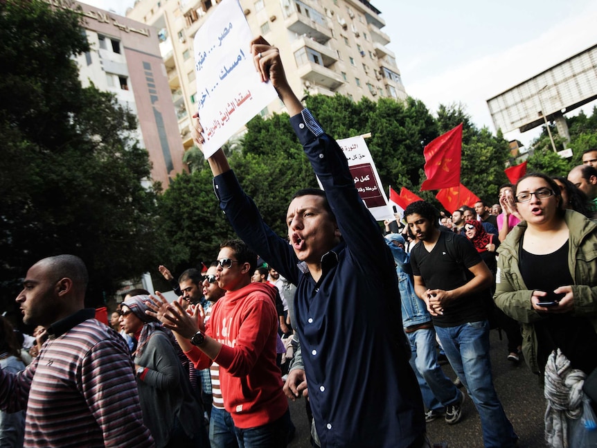Egyptian demonstrators march towards Cairo's Tahrir Square in protest against Mohamed Morsi.