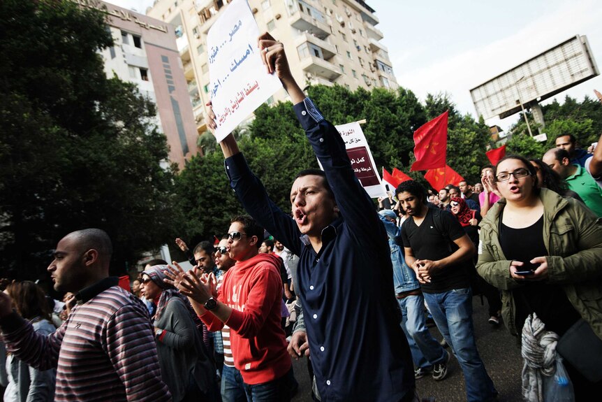 Egyptian demonstrators march towards Cairo's Tahrir Square in protest against Mohamed Morsi.