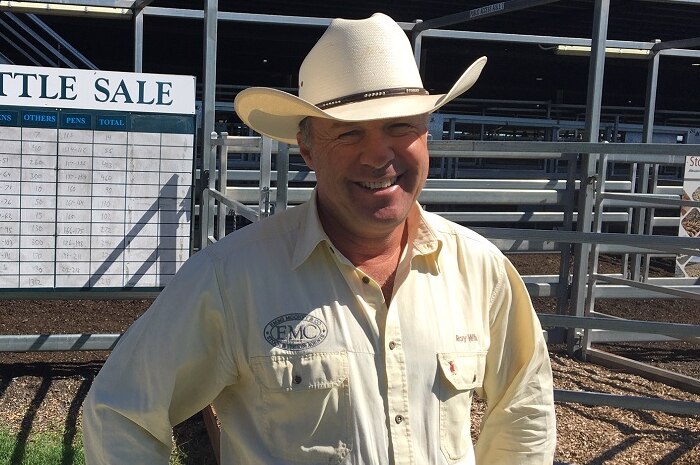 Coonamble livestock agent Tony Mooy standing out the front of the CTLX cattle exchange, wearing a big hat.