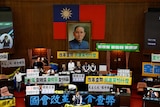 台湾立法院今早对有争议的议案进行三读程序。