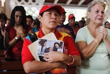 Supporters of Venezuelan president Hugo Chavez pray in a chapel outside a military hospital in Caracas.