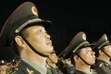 China's People's Liberation Army troops stand to attention