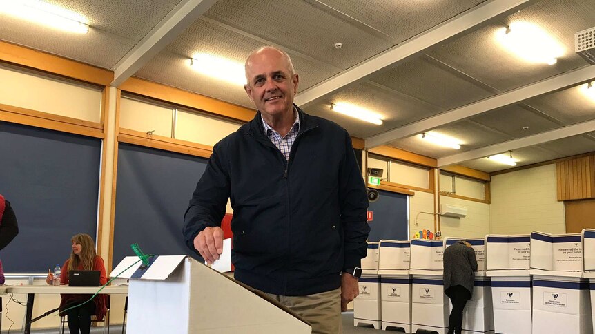 Pembroke candidate Doug Chipman casts his votes
