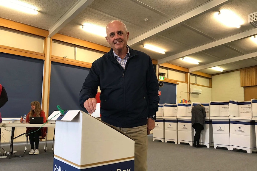 Pembroke candidate Doug Chipman casts his votes